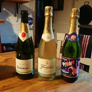 three bottles of non-alcoholic cava