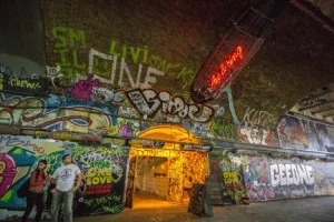 Graffiti in an old arched tunnel