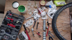 Messy collection of bicycle tools